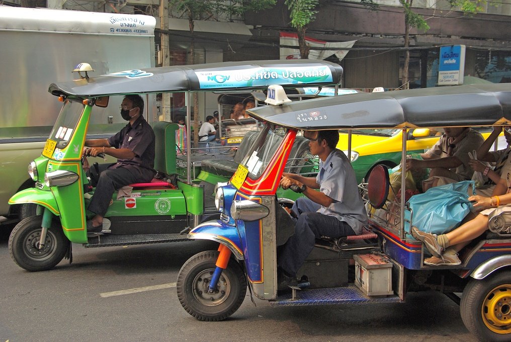 PXK10D_4745.JPG - The tuk-tuks are very colourful but similar prices to taxs. They weave dangerously throught the heavy traffic of Bangkok